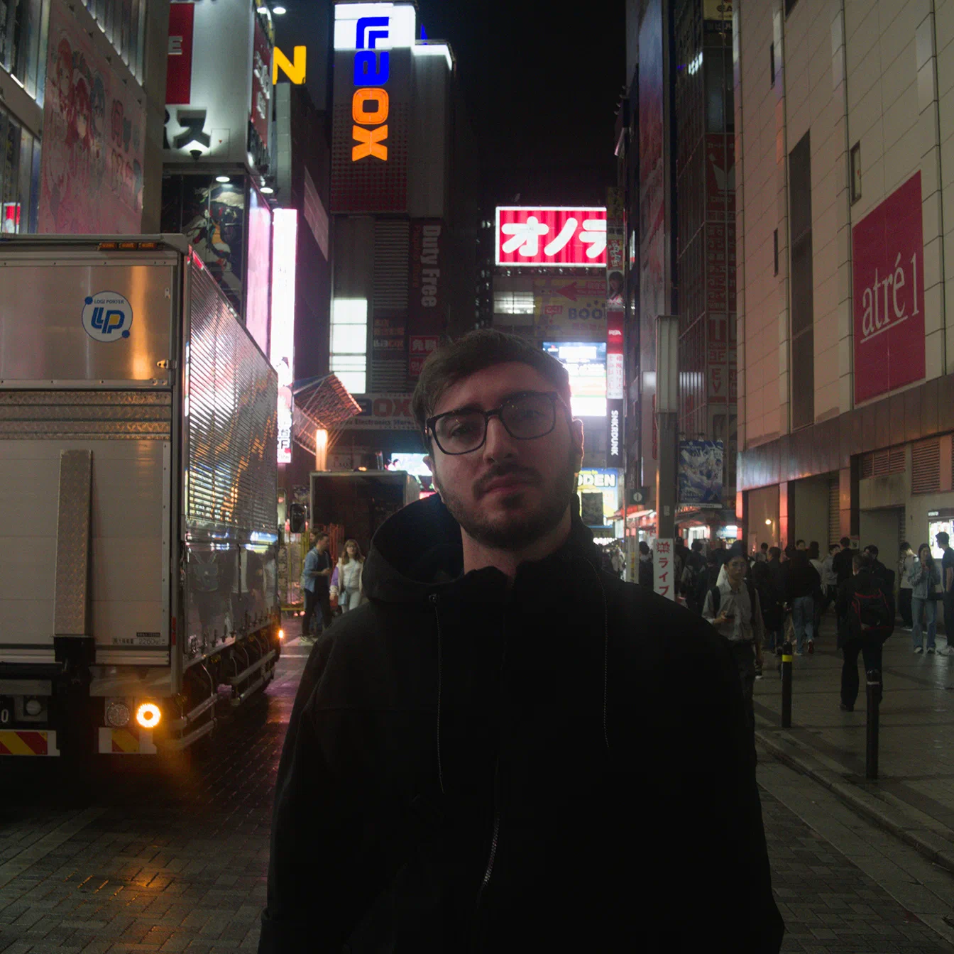 Alfredo Sasso standing on a city street at night